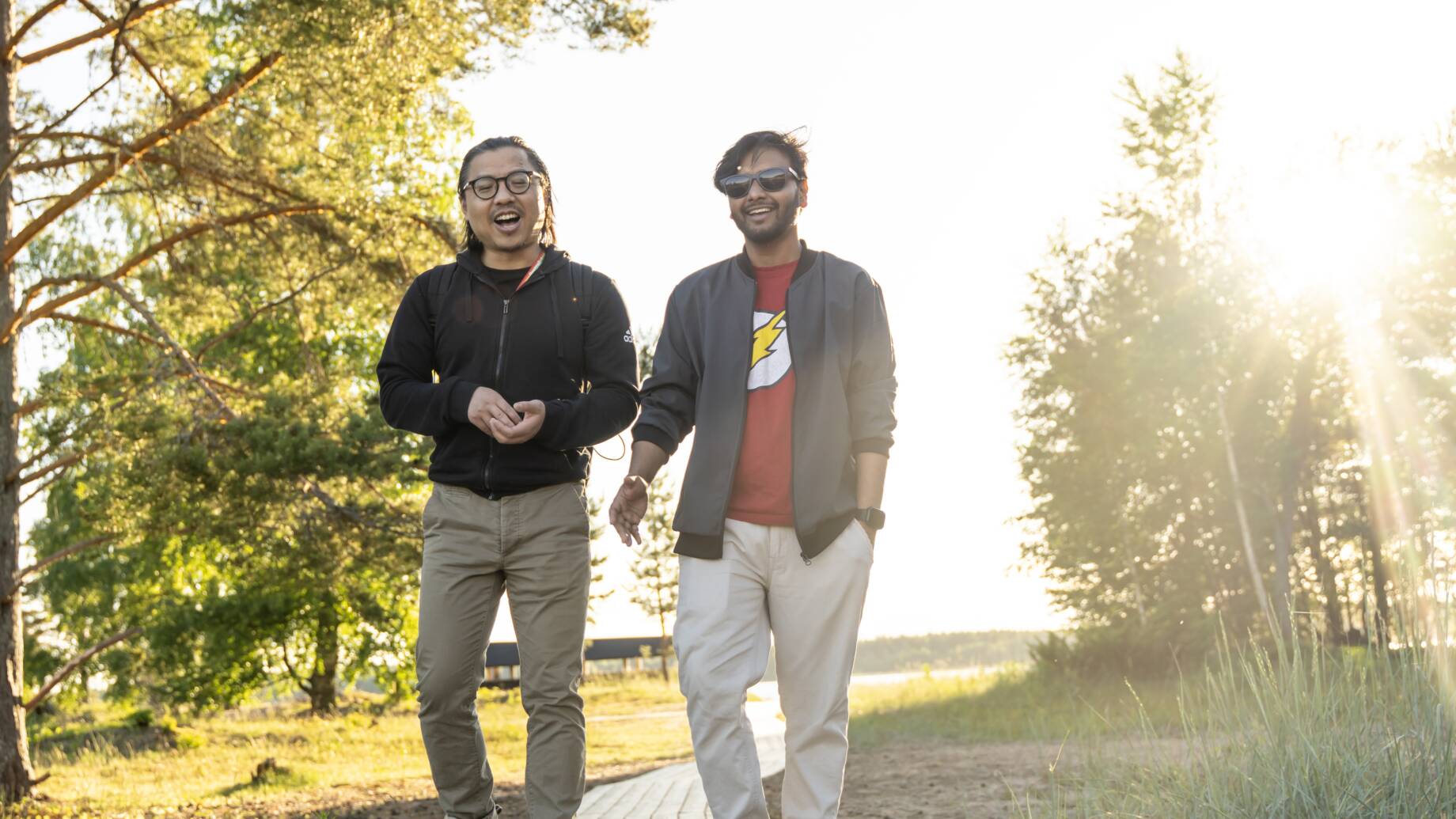 Men walking in the sun